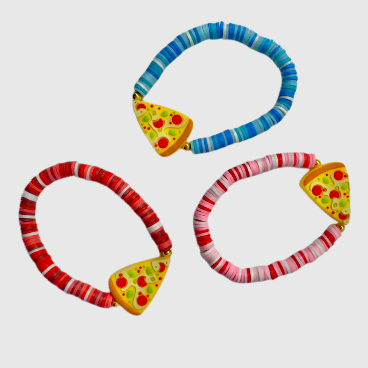 Three colorful bracelets with pizza-shaped beads